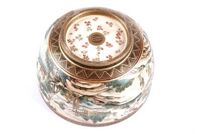 Lot 872 - A Japanese earthenware butterfly bowl