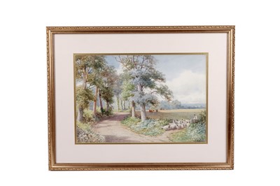 Lot 221 - John Bates Noel - Sheep Meandering by a Country Lane | watercolour