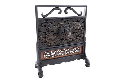 Lot 862 - A Chinese table screen made up from earlier bronze censer cover