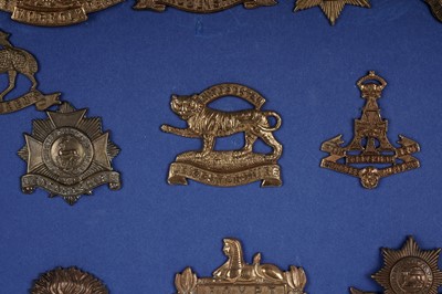 Lot 2 - A First World War (WWI) all brass economy issue display of cap badges