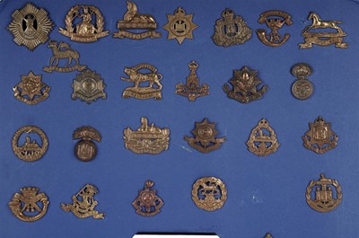 Lot 2 - A First World War (WWI) all brass economy issue display of cap badges