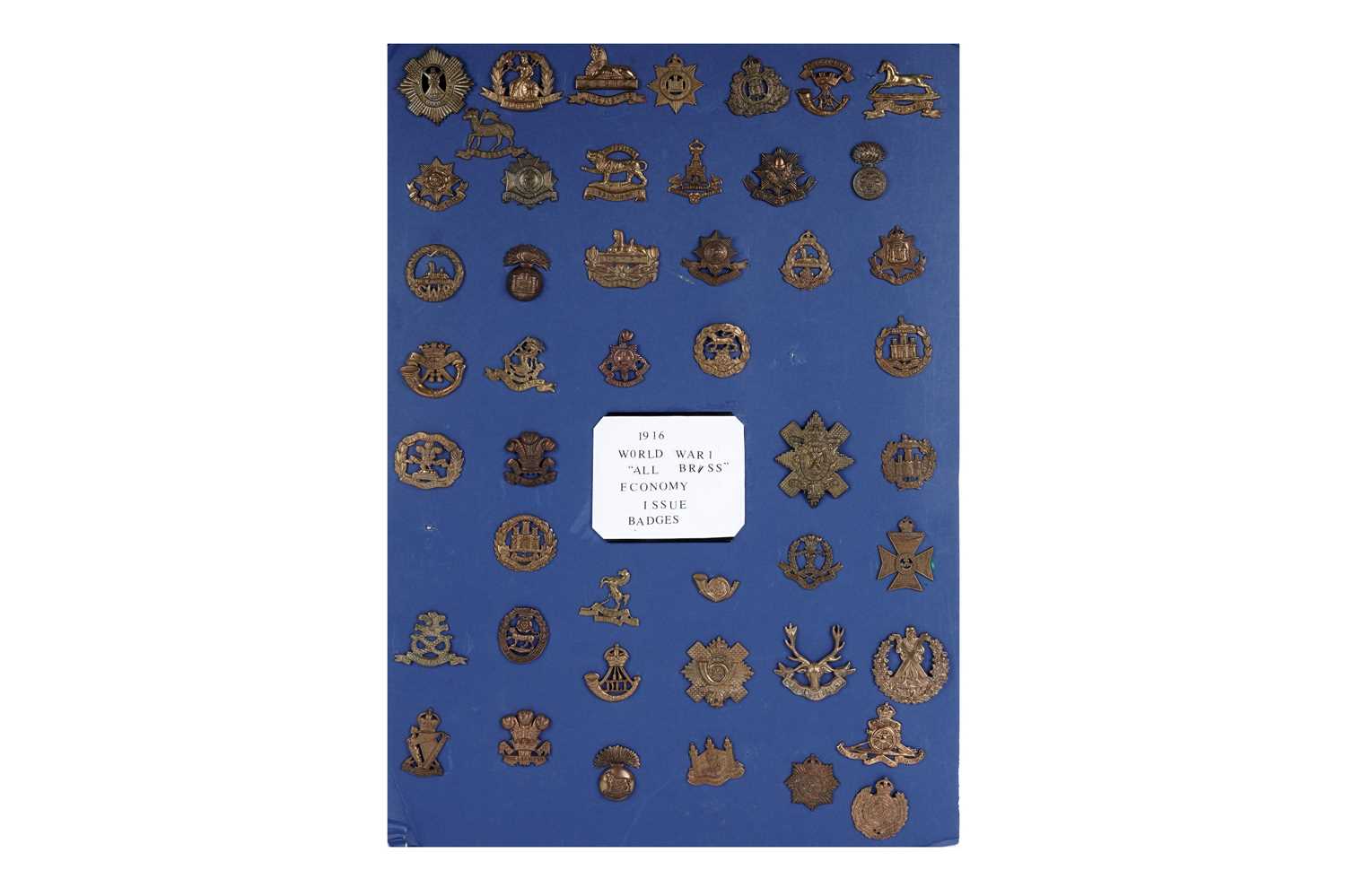 Lot 2 - A First World War (WWI) all brass economy issue display of cap badges