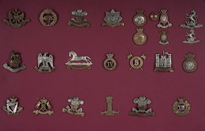 Lot 4 - A display of British Regimental cap badges