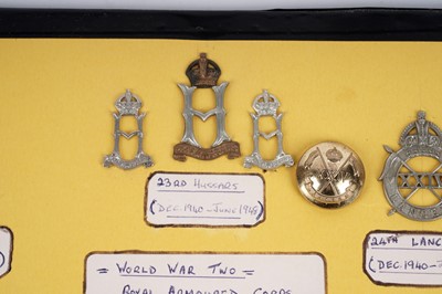 Lot 9 - Second World War Royal Armoured Corps regimental cap and collar badges and buttons