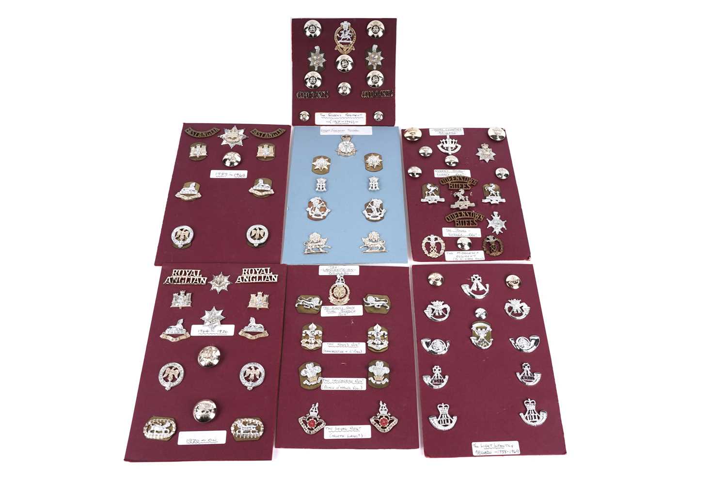 Lot 12 - A selection of second-half 20th Century British Military badge and button displays