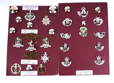 Lot 12 - A selection of second-half 20th Century British Military badge and button displays