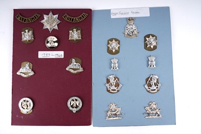 Lot 12 - A selection of second-half 20th Century British Military badge and button displays