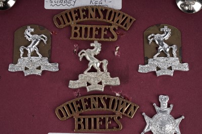 Lot 12 - A selection of second-half 20th Century British Military badge and button displays
