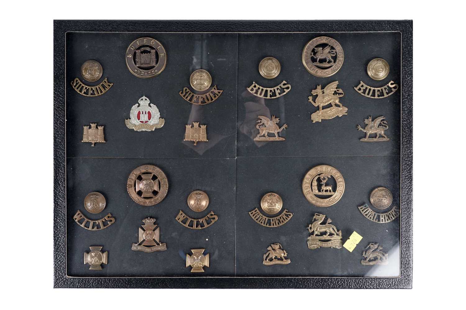 Lot 14 - A display of badges, buttons and titles
