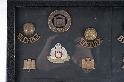 Lot 14 - A display of badges, buttons and titles