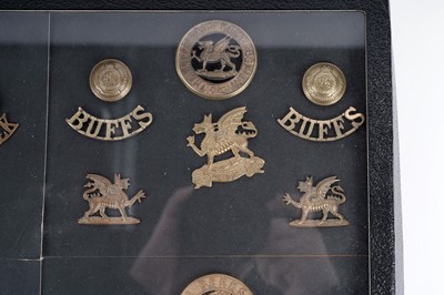 Lot 14 - A display of badges, buttons and titles