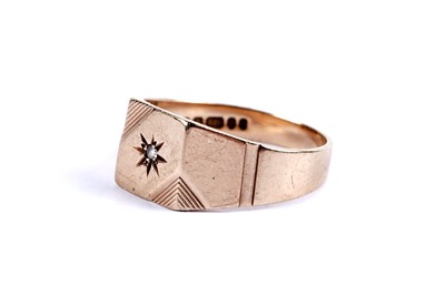 Lot 84 - A star set diamond signet ring; and a gold wedding band