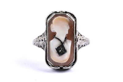Lot 69 - An aquamarine and diamond swivel dress ring