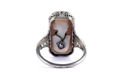 Lot 69 - An aquamarine and diamond swivel dress ring
