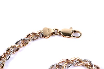 Lot 67 - A tri-colour fancy link chain bracelet