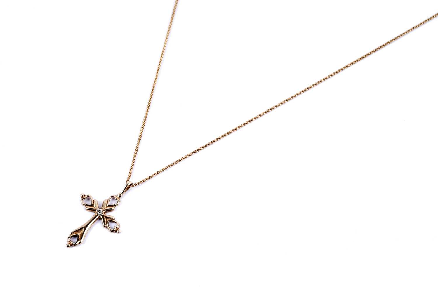 Lot 60 - A diamond crucifix pendant necklace