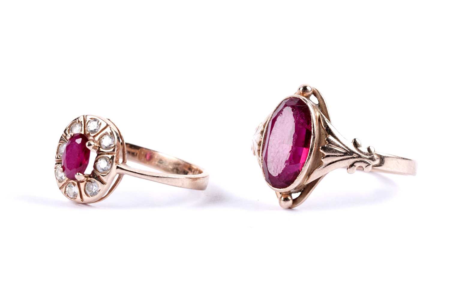 Lot 57 - A ruby and white stone cluster pendant; and a ruby single stone ring