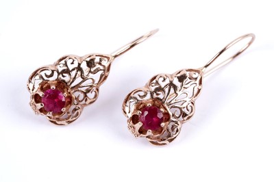 Lot 64 - A pair of ruby drop earrings; and a pair of princess cut CZ earrings
