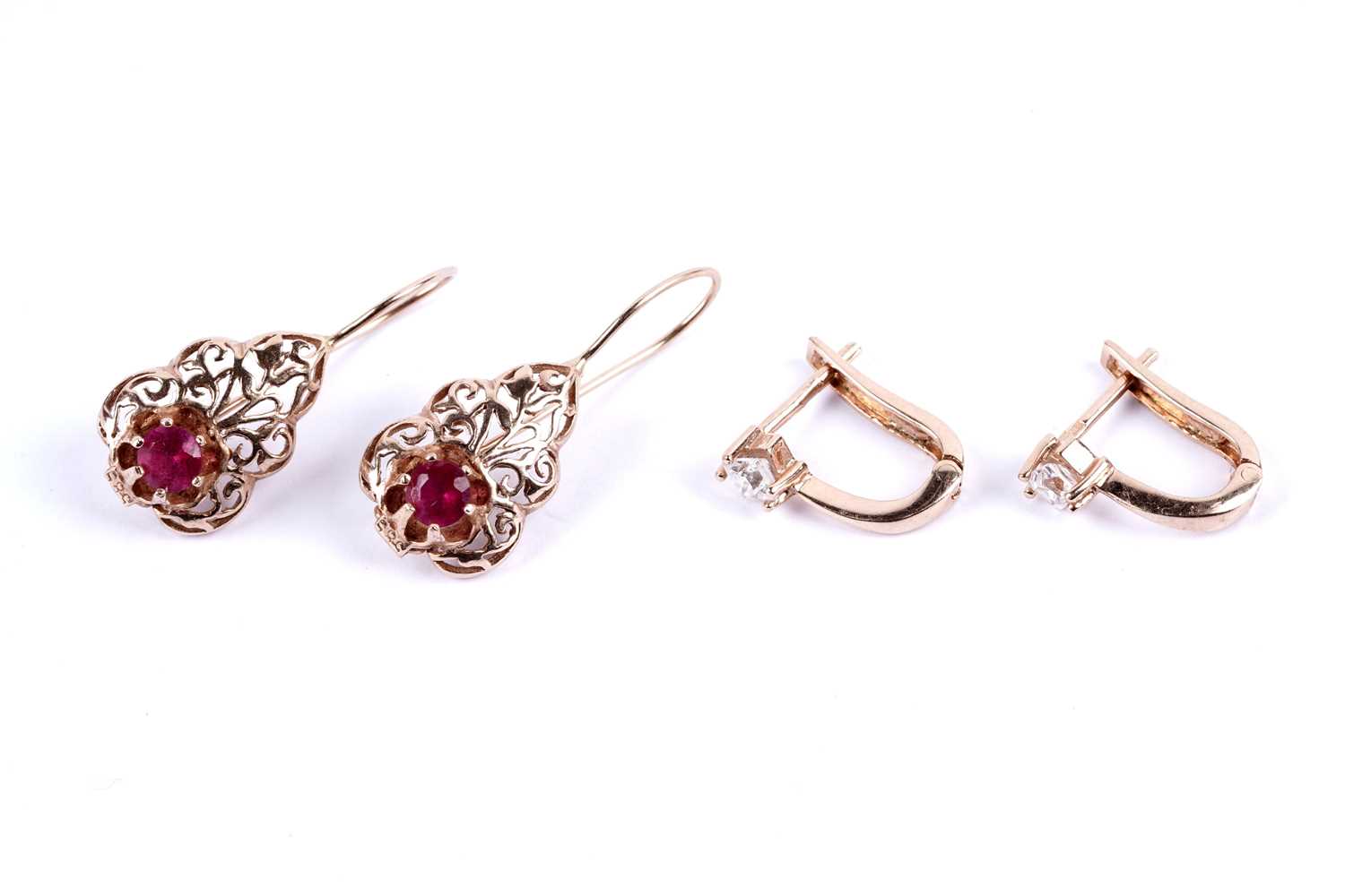 Lot 64 - A pair of ruby drop earrings; and a pair of princess cut CZ earrings