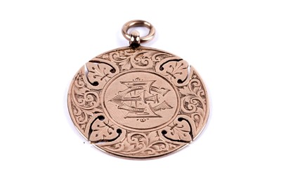 Lot 8 - An Edwardian 9ct rose gold fob medal; and another