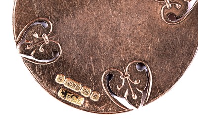 Lot 8 - An Edwardian 9ct rose gold fob medal; and another