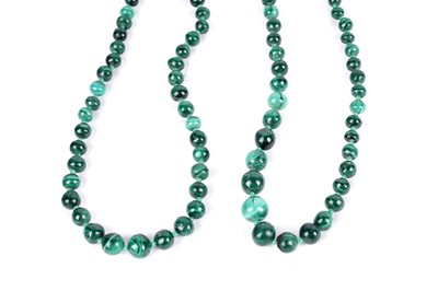 Lot 671 - A set of three malachite bead necklaces; and a pair of cultured pearl earrings