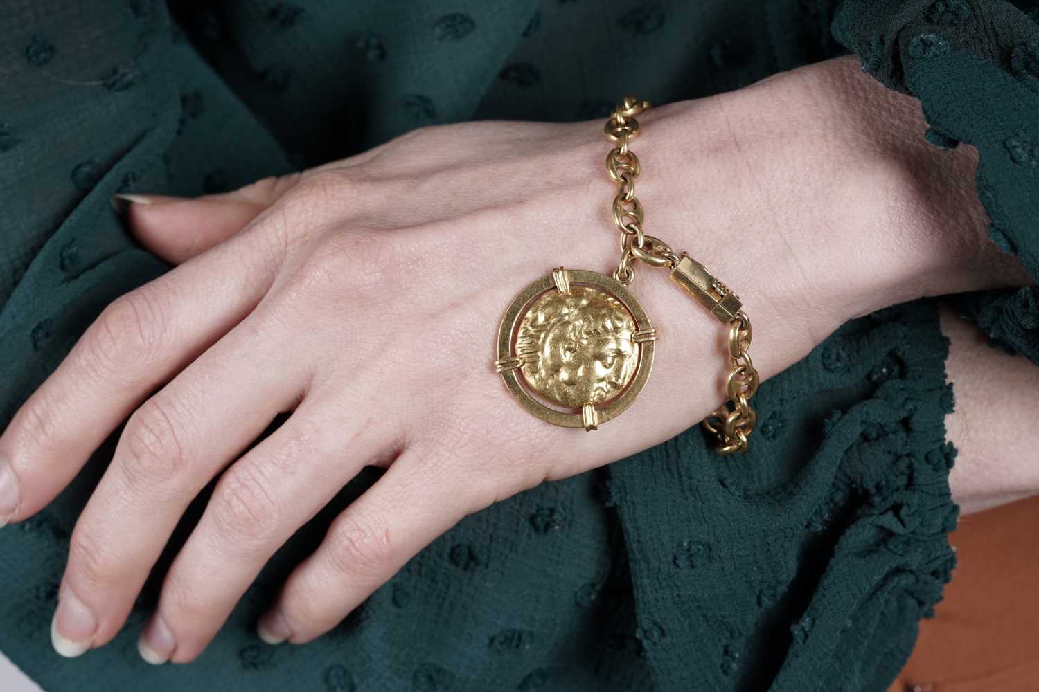 Lot 503 - Ilia Lalaounis gold anchor link bracelet with Alexander the Great style coin