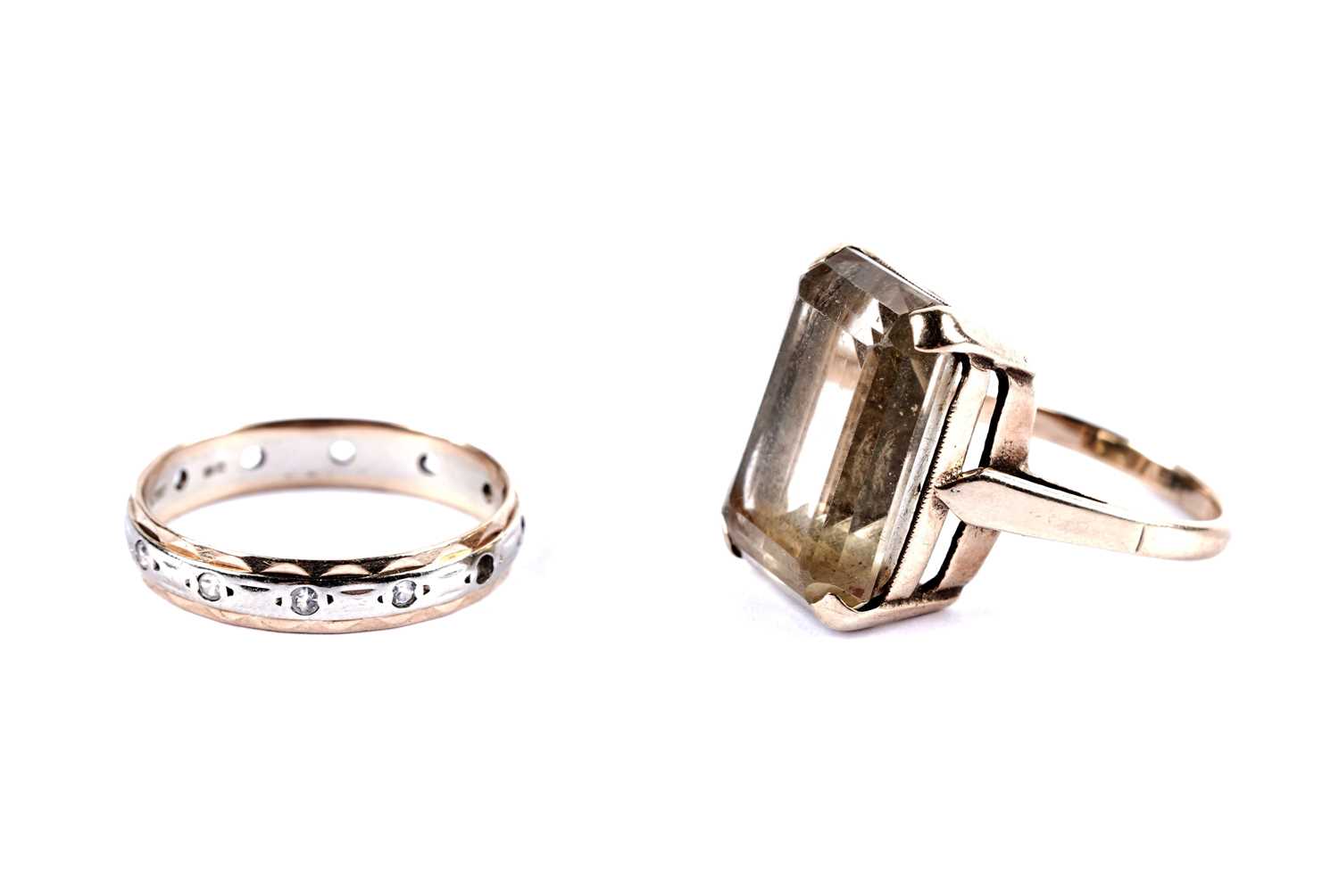 Lot 12 - A citrine cocktail ring; and an eternity ring