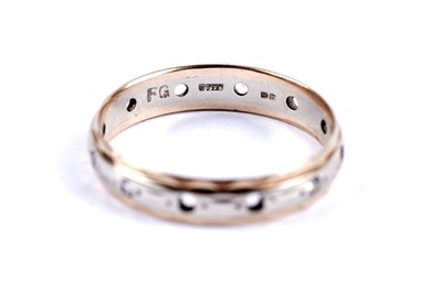 Lot 12 - A citrine cocktail ring; and an eternity ring