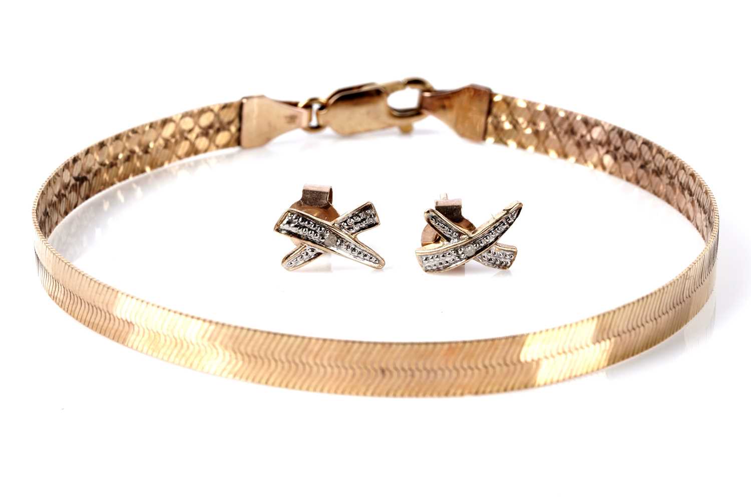 Lot 138 - An Italian rose gold bracelet; and a pair of diamond earrings