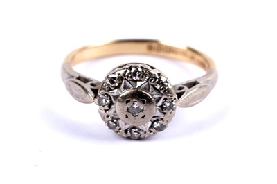 Lot 113 - A diamond cluster ring; and a diamond three stone ring
