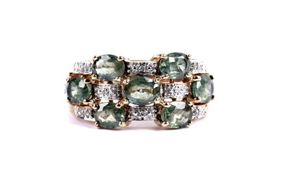 Lot 114 - A green topaz and diamond dress ring