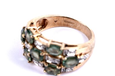 Lot 114 - A green topaz and diamond dress ring