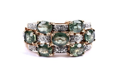 Lot 114 - A green topaz and diamond dress ring