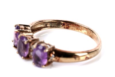 Lot 122 - An amethyst and diamond dress ring