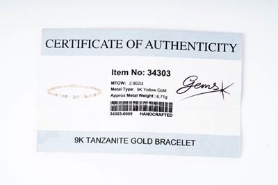 Lot 128 - A tanzanite tennis bracelet