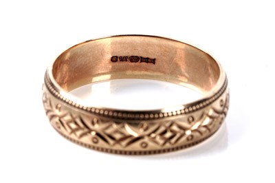 Lot 124 - Two 9ct gold wedding rings; and another