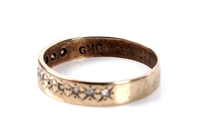 Lot 124 - Two 9ct gold wedding rings; and another