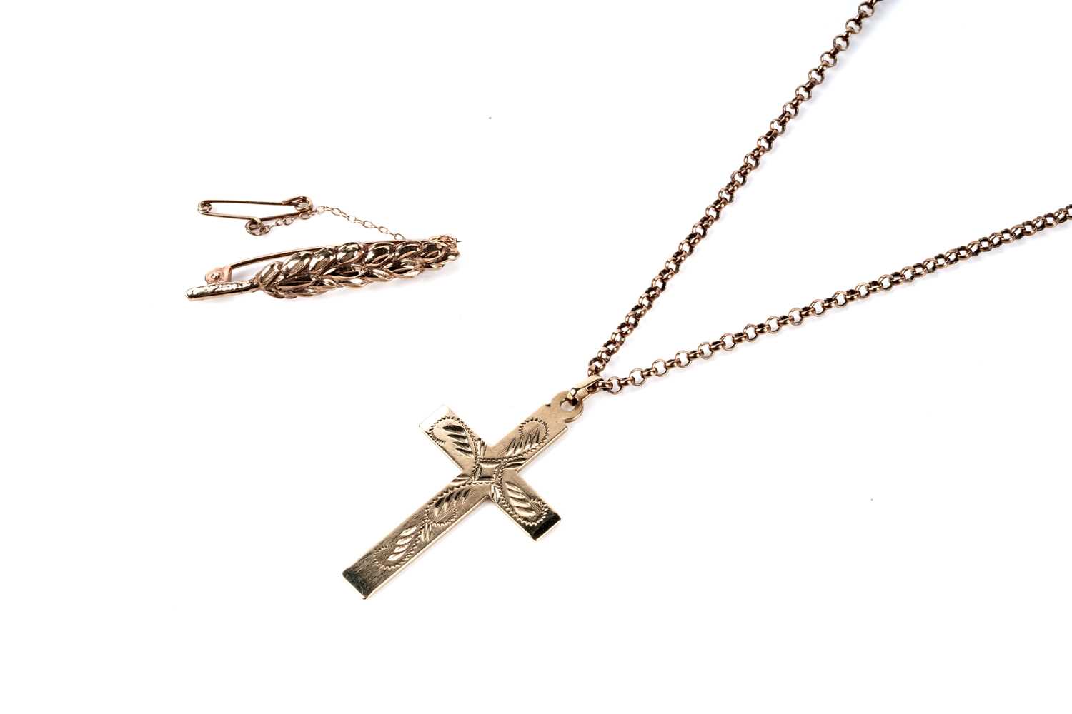 Lot 117 - A 9ct yellow gold crucifix pendant; and a bar brooch