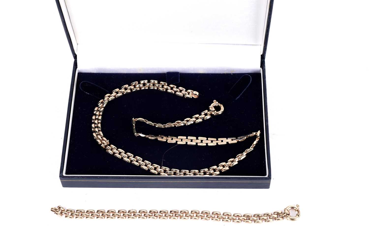 Lot 133 - A yellow gold panther link chain necklace; and bracelet