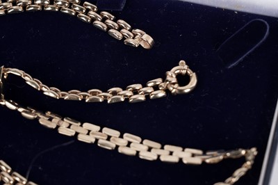 Lot 133 - A yellow gold panther link chain necklace; and bracelet
