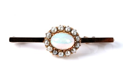 Lot 118 - An opal and seed pearl cluster bar brooch