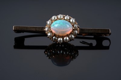 Lot 118 - An opal and seed pearl cluster bar brooch
