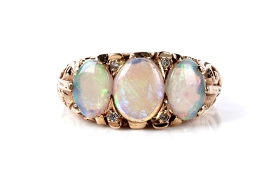 Lot 123 - An opal and diamond ring