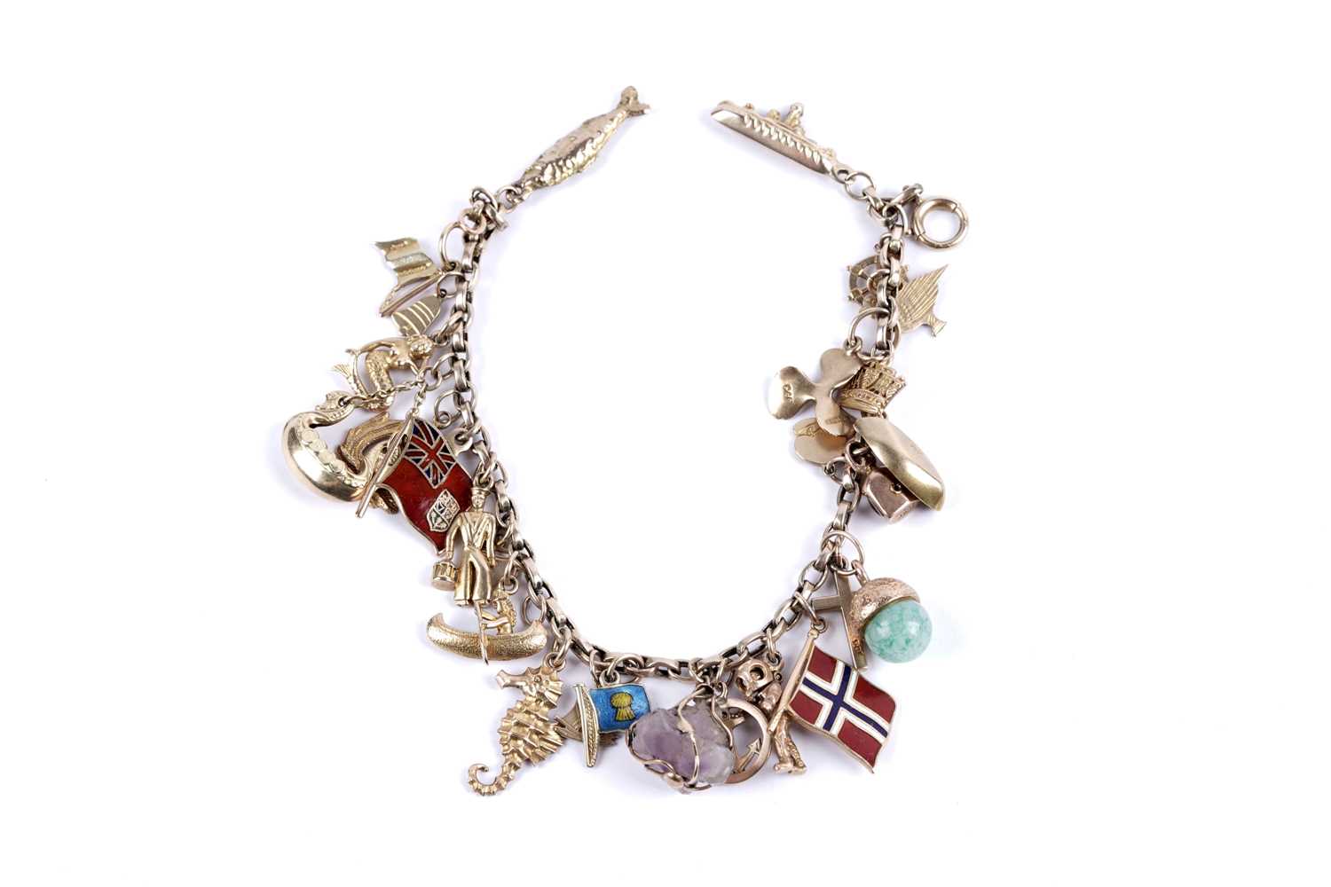 Lot 108 - A yellow gold charm bracelet