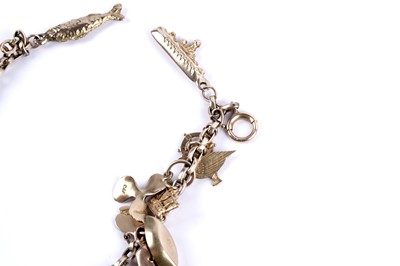 Lot 108 - A yellow gold charm bracelet