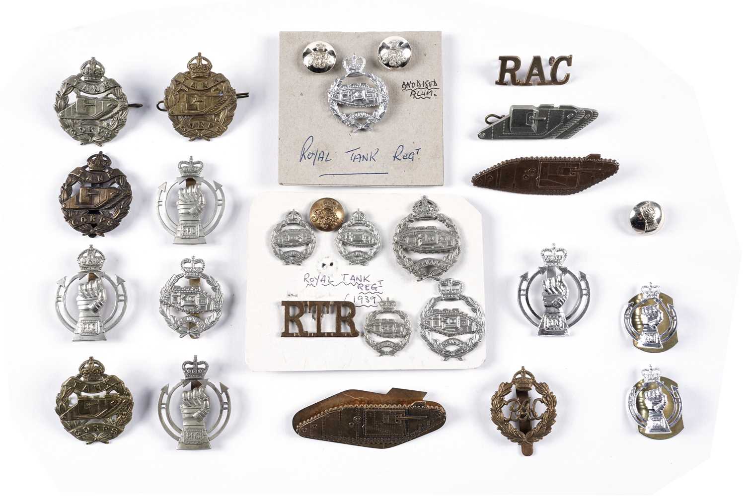 Lot 22 - The Royal Tank Regiment and other badges, buttons and titles