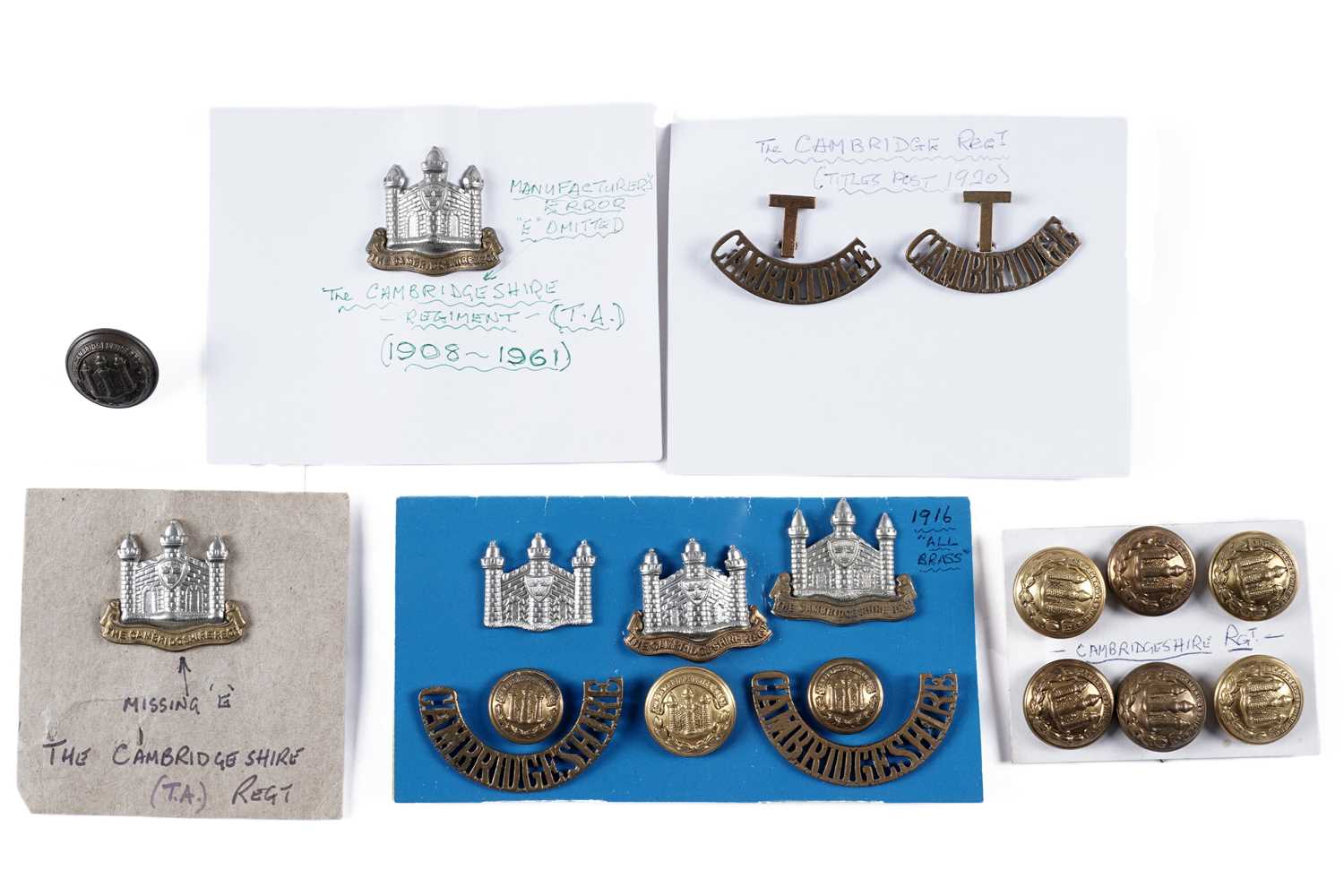 Lot 26 - The Cambridge Regiment First World War and later collar badges, buttons and titles