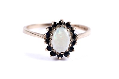 Lot 51 - Two opal cluster dress rings
