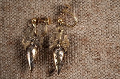 Lot 773 - A pair of Victorian hollow cast gold earrings